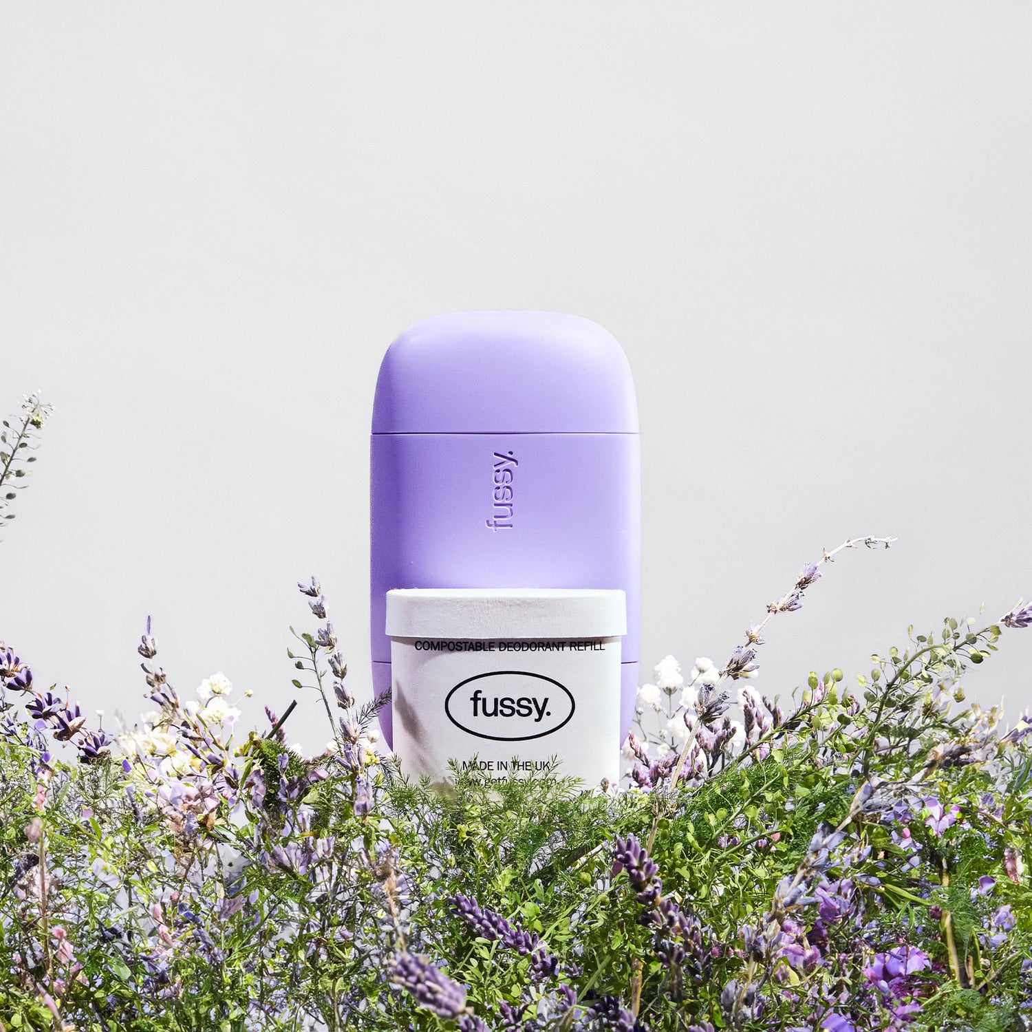 Fussy's natural, refillable deodorant starter pack in Lavender Fields scent (lavender, geranium, vetiver) with deodorant case in Lilac colour.
